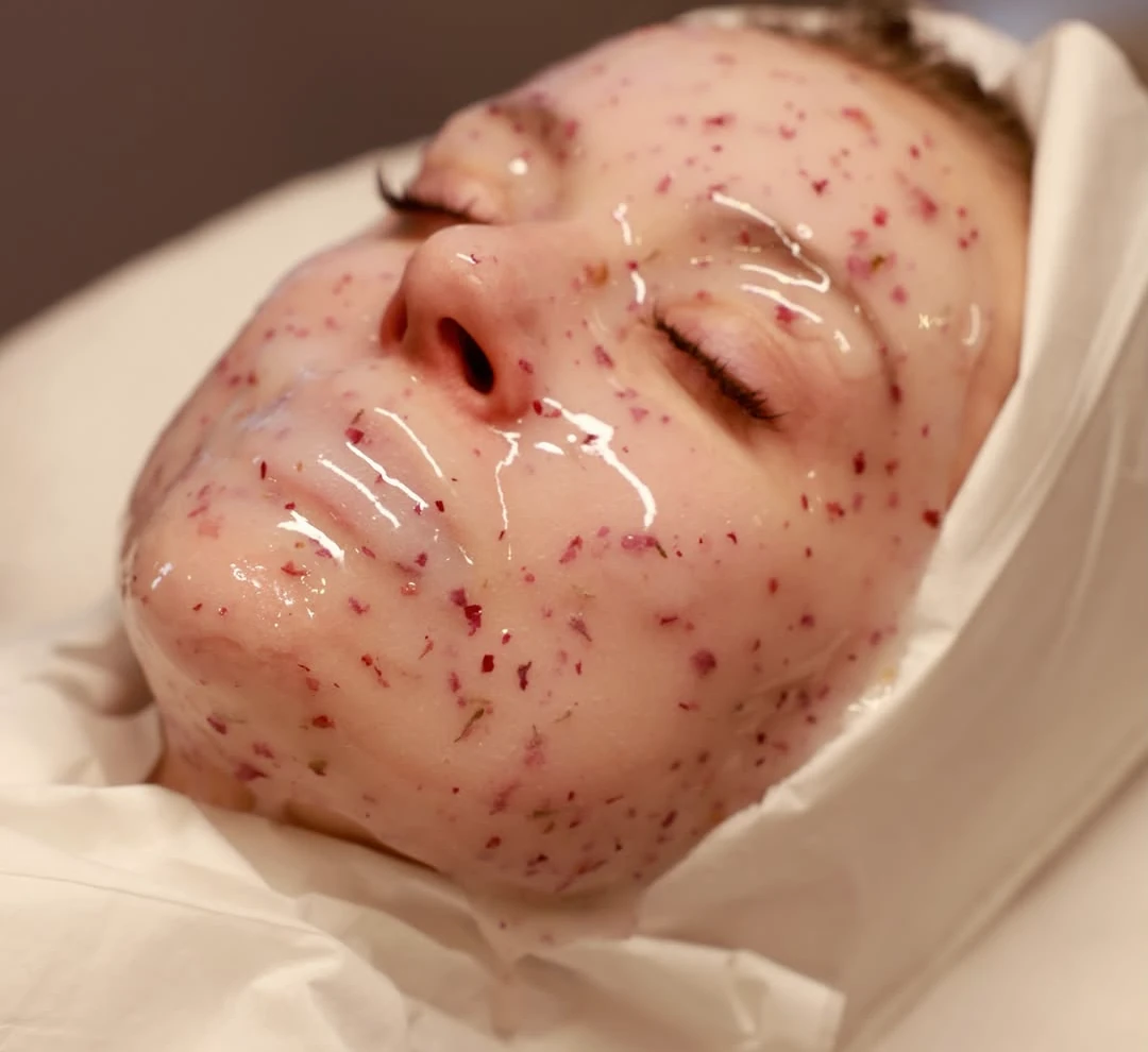 A gel mask resting on the skin during a BE SPACE facial.